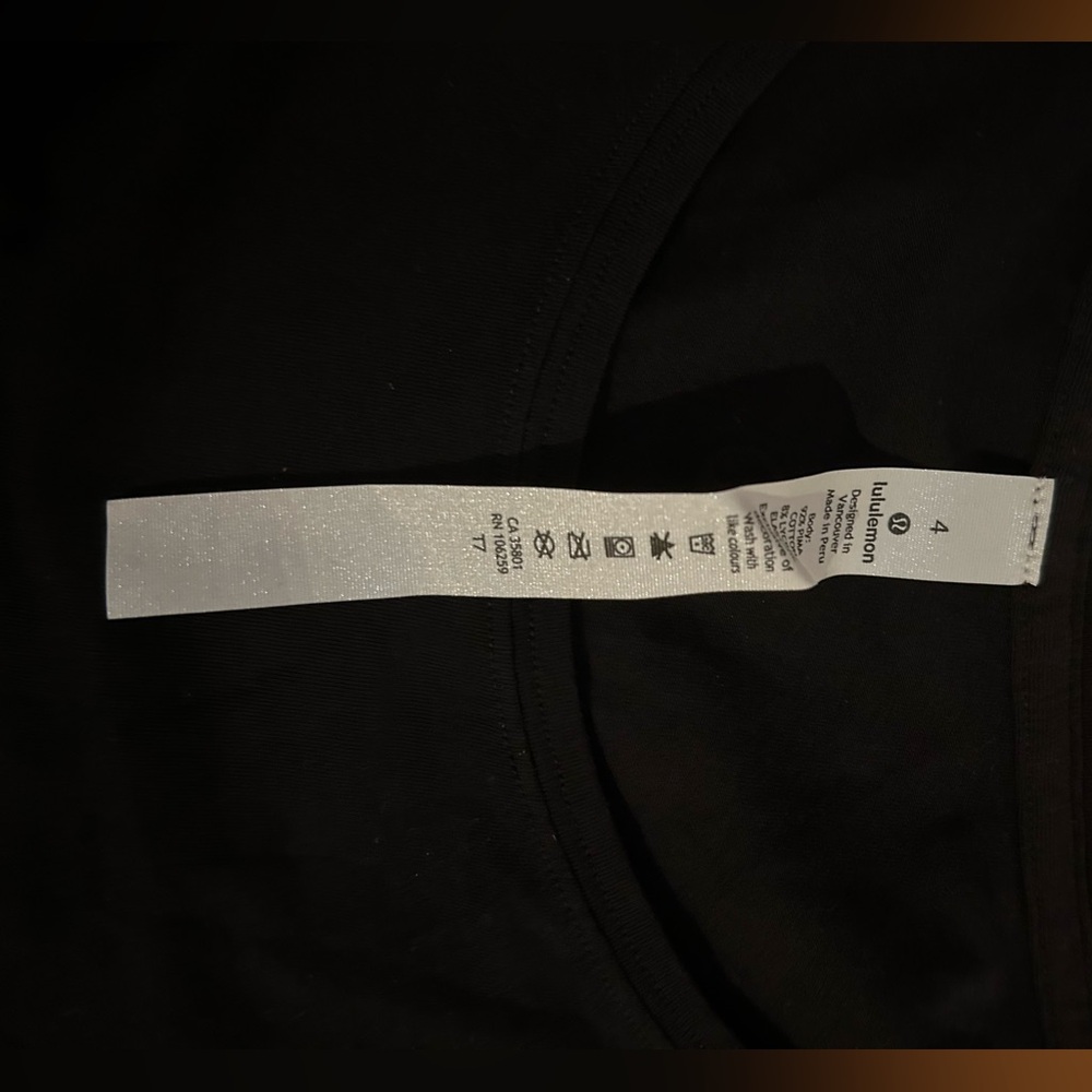Lululemon "Love" black women's crewneck T shirt. Never Been Worn with tags